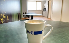 A cup with H2O print
